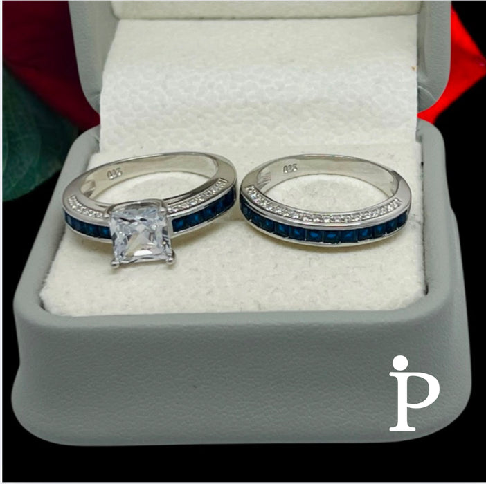 T-21 Trio of .925 Silver rings, with Sapphire Blue Zirconia.