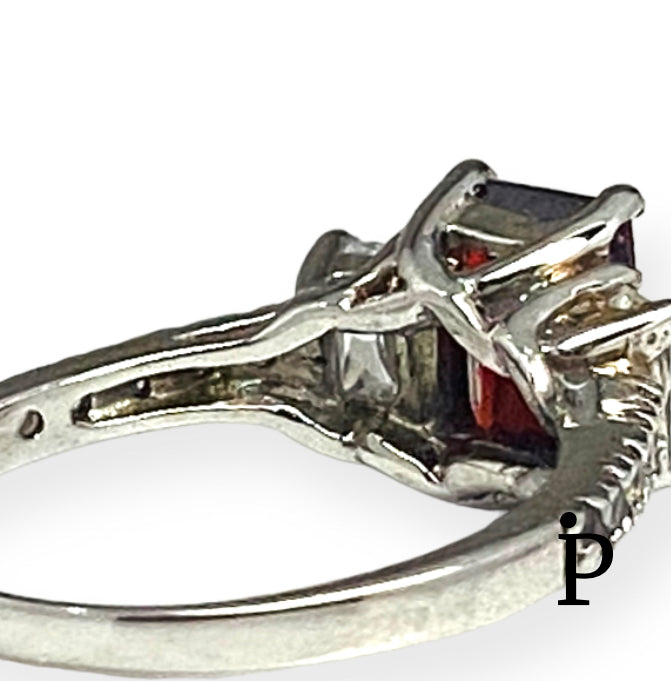 (AE-03) .925 Silver Ring with Zirconia in three main colors garnet and two white.