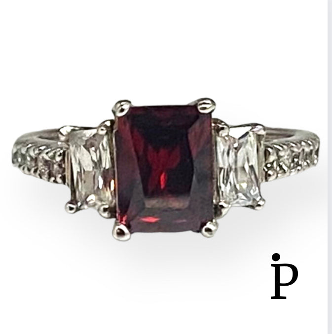 (AE-03) .925 Silver Ring with Zirconia in three main colors garnet and two white.