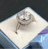 Anillo De Plata De Ley de Eternidad con Halo de CZ Ovalado - JoyeriaParis