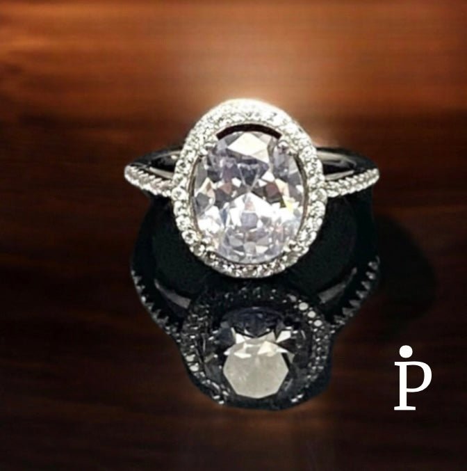 Anillo De Plata De Ley de Eternidad con Halo de CZ Ovalado - JoyeriaParis