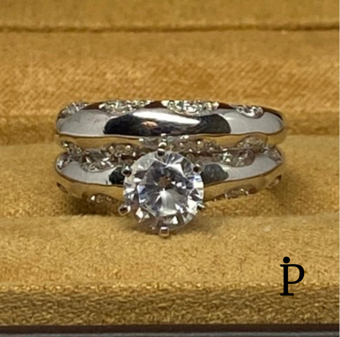 (ACP-13) .925 Silver Double Engagement Ring with Cubic Zirconia in a round shape.