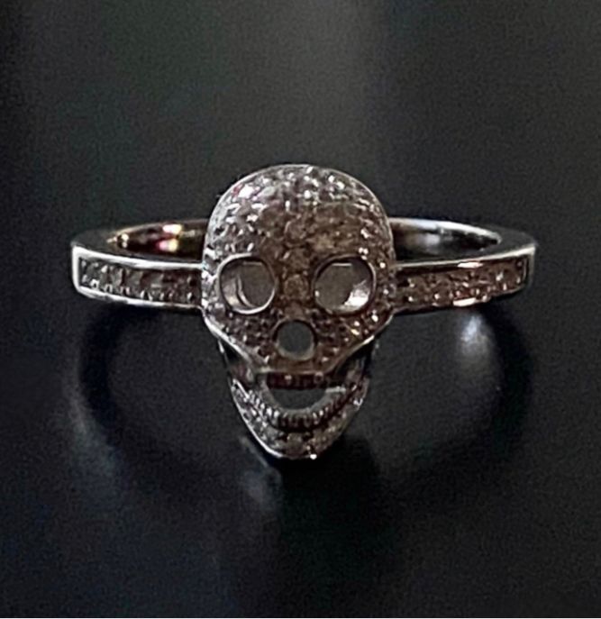 (AE-59) .925 Silver white skull ring with zircons.