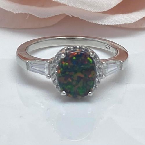(AE-80) .925 Silver ring with dazzling oval black opal zircons.