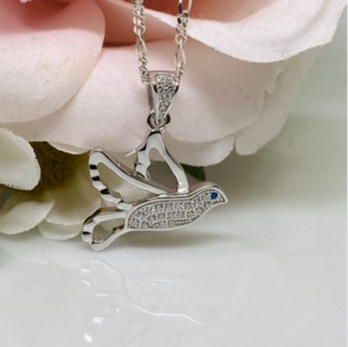 (CCP-07) .925 Silver Chain With Pendant in the shape of a dove.