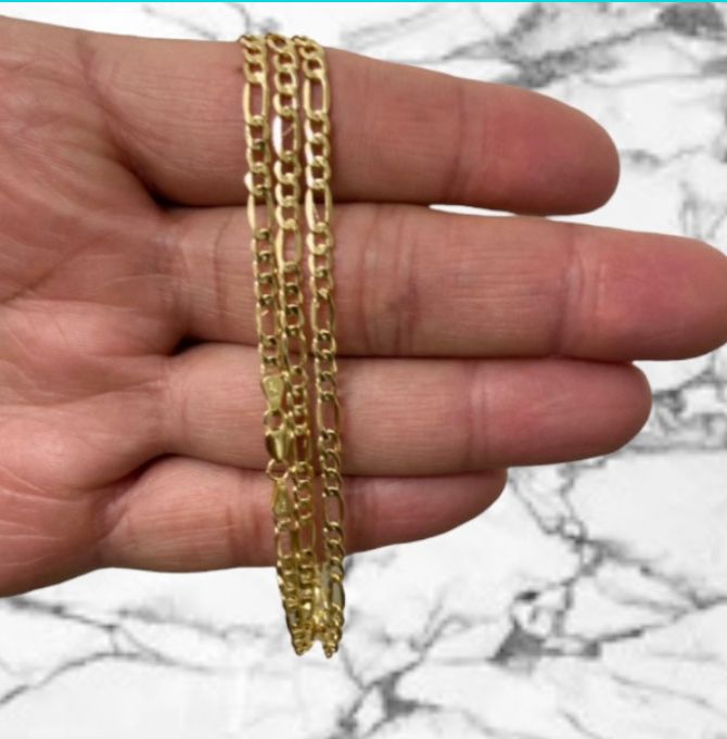 14K Yellow Gold Chain, figaro style, measures 24” - 3 mm approx.