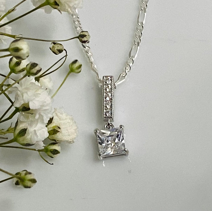(CCP-51) .925 Silver Chain 24”- 2mm Approx. With a Solitaire Pendant and 5 Zirconia.
